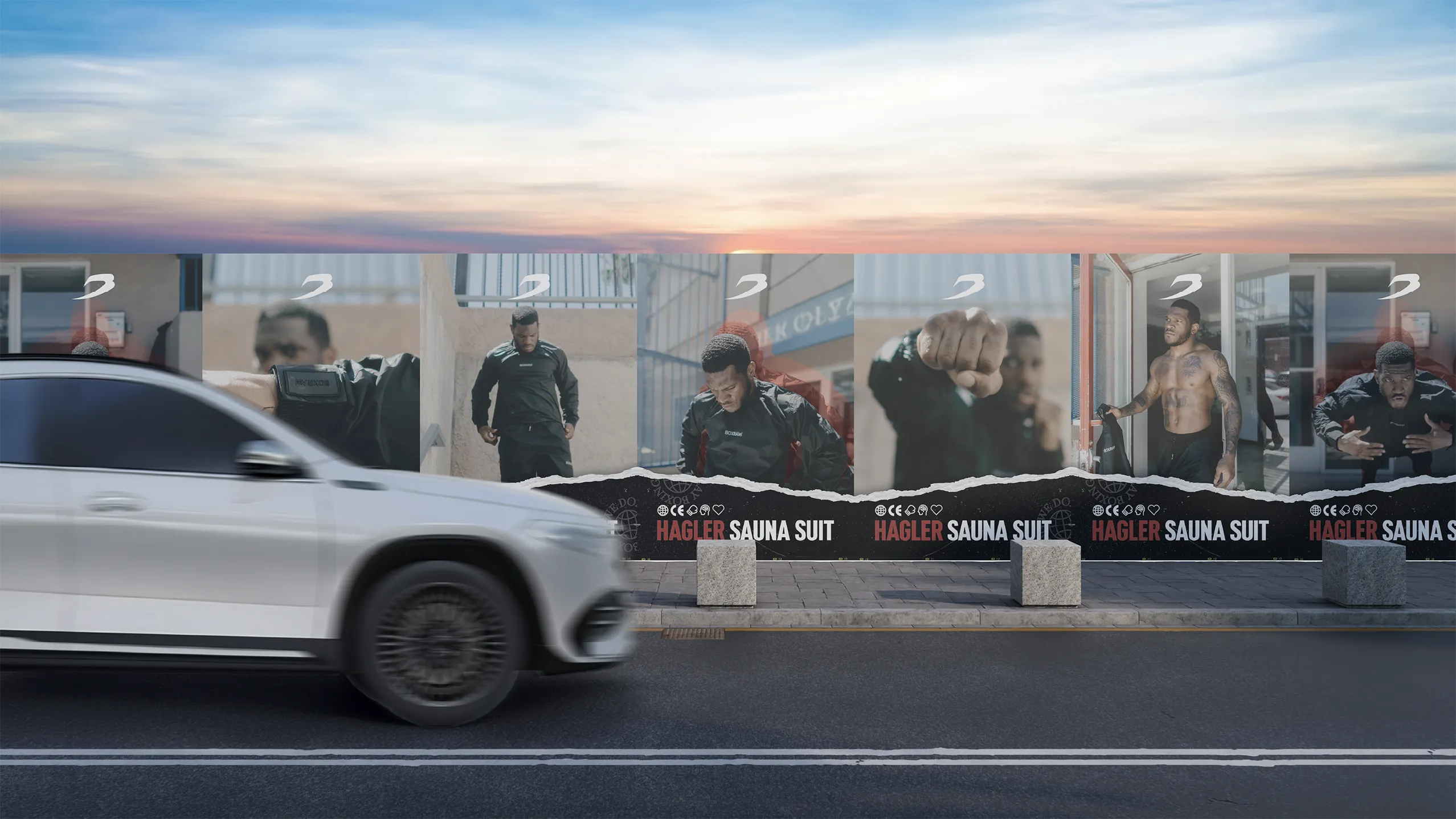 Hagler Sauna Suit posters running along a row of roadside bus shelters at dusk as a car passes.