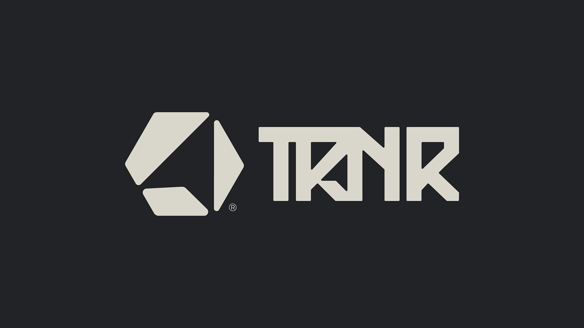 TRNR logo lockup on charcoal
